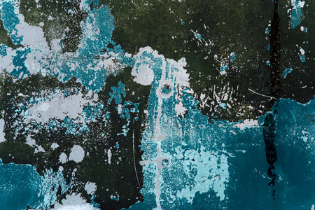 Grunge rusty metal texture with cracked peeling paint, rough distressed surface. Ideal for backgrounds and overlaysの写真素材