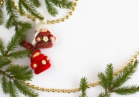 Christmas toy and fir tree on a white backgroundの写真素材