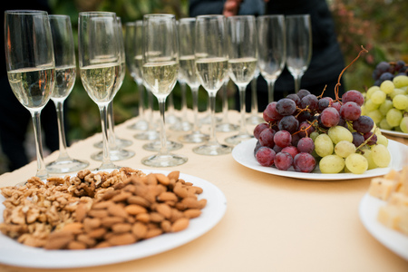 catering: champagne, grapes, nutsの写真素材