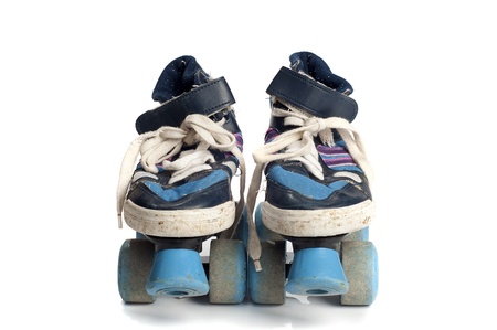 old blue roller blades isolated on white background