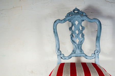 Upholstery work. Wooden chair painted with beautiful fabricの写真素材