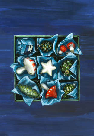 Christmas ornaments box with vintage decorations on a blue background. Top view with copy space. Hand drawn gouache paint for New Year banner and Xmas greeting cardの写真素材