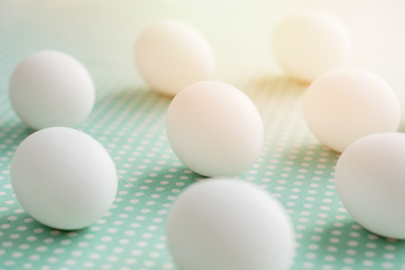 Eggs on dotted fabric backgroundの写真素材