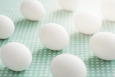 Eggs on dotted fabric backgroundの写真素材