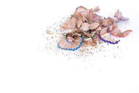 Pencil isolated on white background, colorful shavings, top viewの写真素材