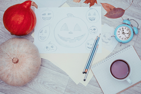 Drawing pencil sketches of halloween pumpkins.の写真素材