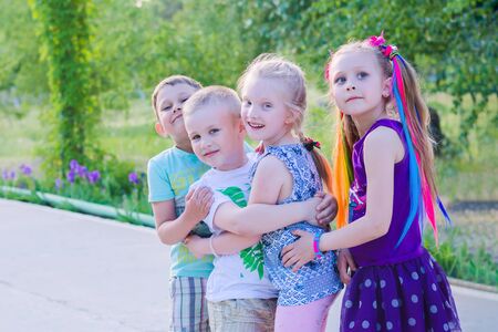 ENERGODAR, UKRAINE - May, 2018: happy smiling children are playing outdoors in sunny day.のeditorial素材