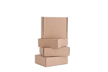 Stack of craft paper boxes isolated on white. Mock up.の写真素材