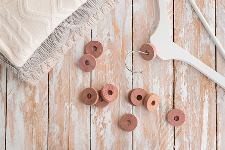 Wooden round cedar rings for hangers for moth protection.の写真素材