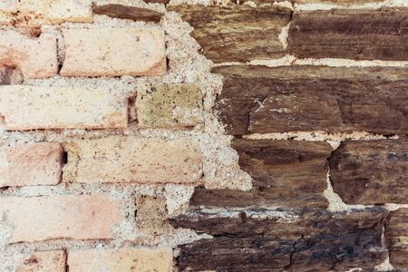 Brown and white brick wall outdoor background. Stone texture. Grungeの写真素材