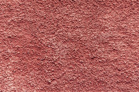 Orange stone wall outdoor background. Stone texture. Grungeの写真素材