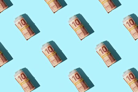 Pattern with money ten euro isolated on blue background.の写真素材