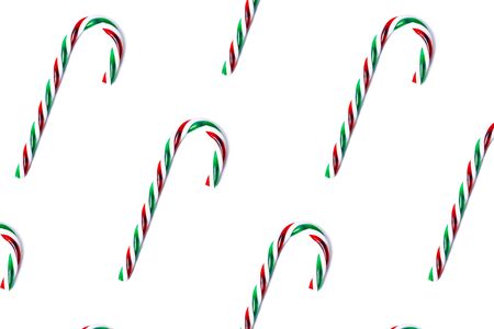 Green and red candy canes pattern isolated on white, top view.の写真素材