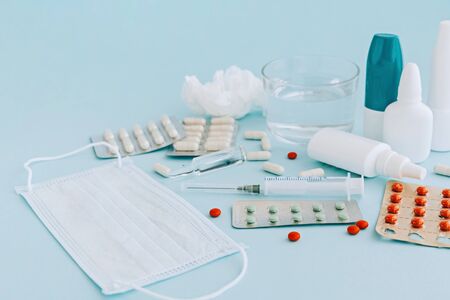 Set of pills and bottles of nose drops for treatment various viruses symptoms. Treatment of seasonal...