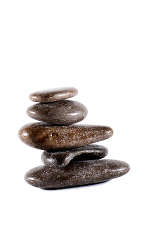 pyramid of grey pebble isolated on white backgroundの写真素材