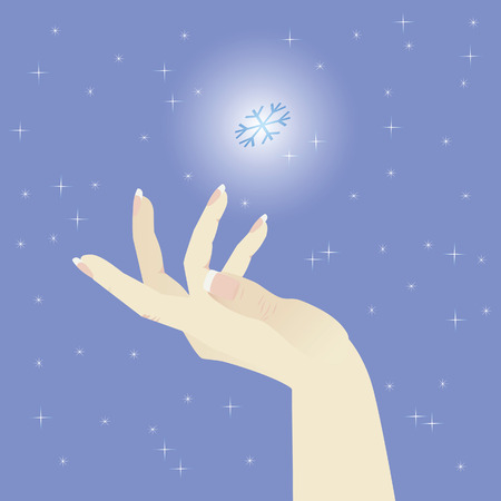 This is a hand that catches a snowflake.のイラスト素材