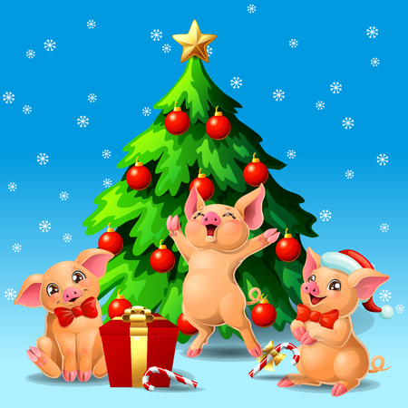Card three joyful cute yellow pigs with red bow and a fir-tree with spheres and star, a Candy cane and gift box on blue with snowflakers. A vector illustration in cartoon style, verticalのイラスト素材