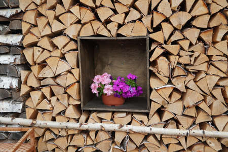 decor of folded firewood and flowers