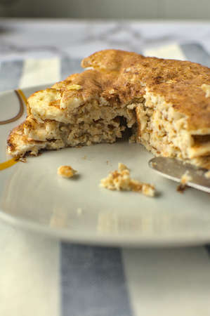 Close up of protein pancake tower split. Healthy breakfast