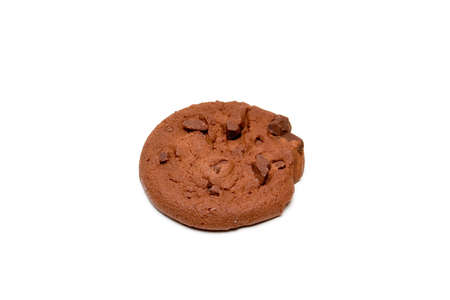 A solitary chocolate chocolate chip cookie isolated on a white background.
