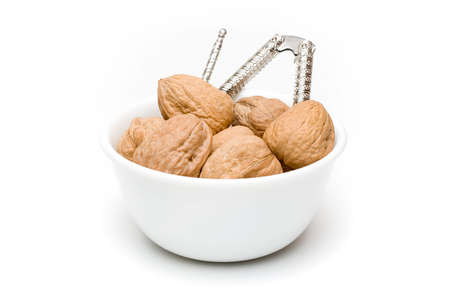 A bowl of walnuts ready to be consumed.の写真素材