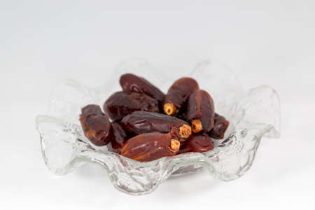 dried date fruit on white background