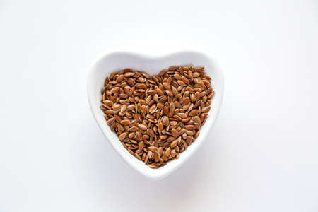 flaxseed in heart shaped bowl