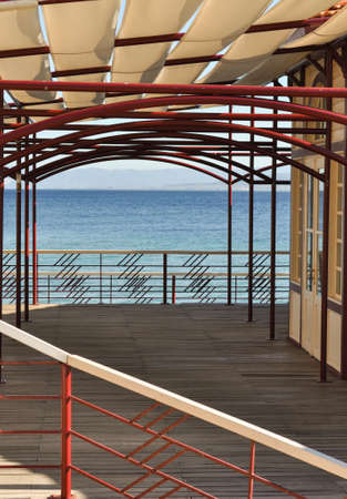 View on sea from terrace of old restaurant. Minimal Composition of horizontal lines. Summer scene.の写真素材
