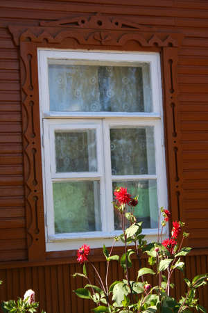 Russian style window and dahlias.