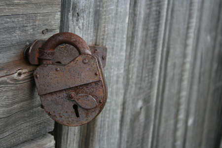 Old rusted padlockの写真素材