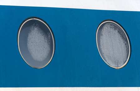 Two window on blue board passenger aircraftの写真素材