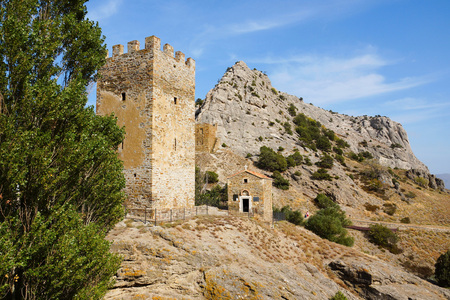 Old church made of natural stone. near one of the towers of the Genoese fortress. architectural monument.のeditorial素材