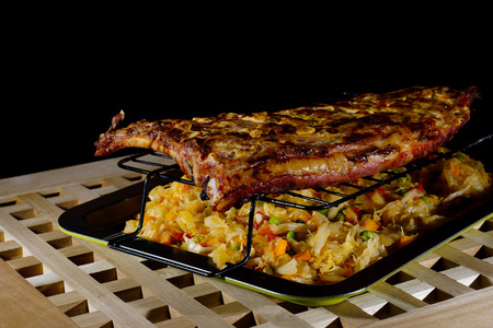 Grilled meat. Grilled pork ribs with braised cabbage.の写真素材