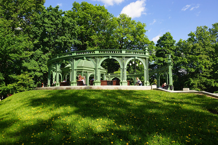 Moscow, Russia- May 19, 2019. Rotunda in Ostankino Park. People relax in the open gazebo on a summer dayのeditorial素材