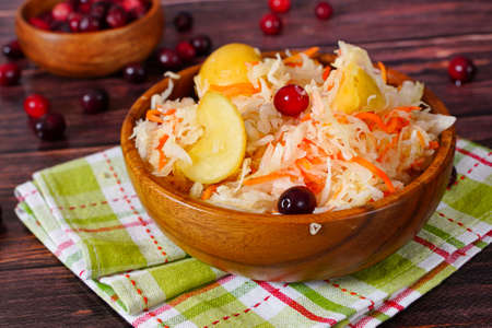 Sauerkraut with apples and cranberries. Traditional Russian foodの写真素材