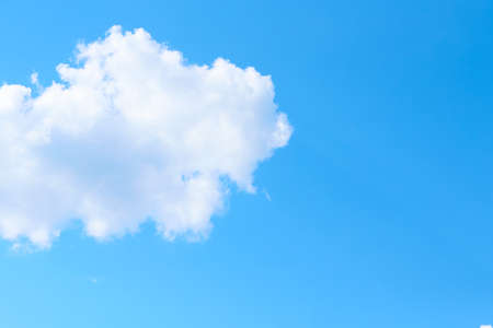 Blue sky and white big clouds abstract illustration. The light of day in the sky. The composition of...