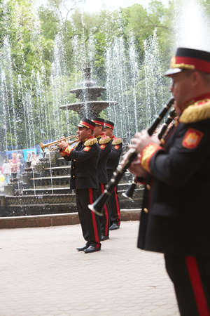CHISINAU/MOLDOVA - 05.14.2016: Moldovan military orchestra is playing music in central park, during...