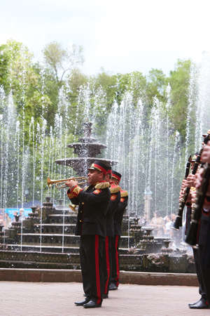 CHISINAU/MOLDOVA - 05.14.2016: Moldovan military orchestra is playing music in central park, during...