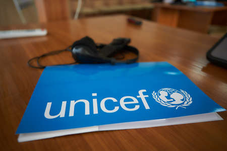 folders and notebooks with logo Unicefのeditorial素材