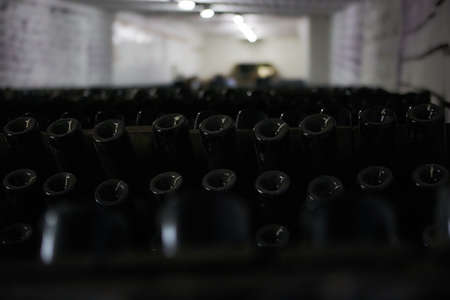 old traditional beverage cellar, poor light. sparkling wine production area. The wine cellar.