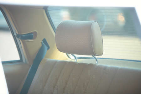 Close up of the beige classic vintage car seat. Image is vintage effect and soft light photoの写真素材