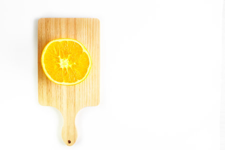Orange fruits and cutting board isolated on white background. chopping boardの写真素材