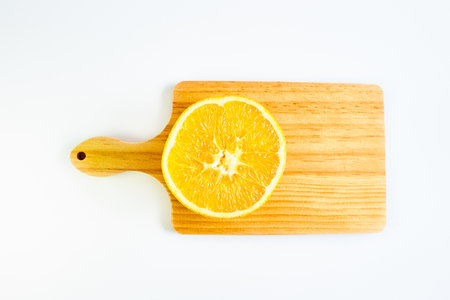 Orange fruits and cutting board isolated on white background. chopping boardの写真素材
