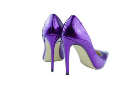 Close up of purple high heels on white background.の写真素材