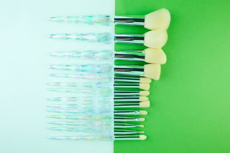 Professional makeup brushs for face isolated on white and green background.の写真素材