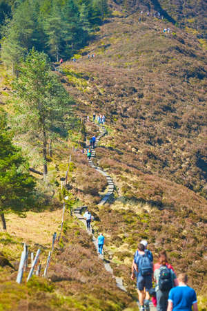 Group of hikers on mountains Glendalough at early spring.のeditorial素材