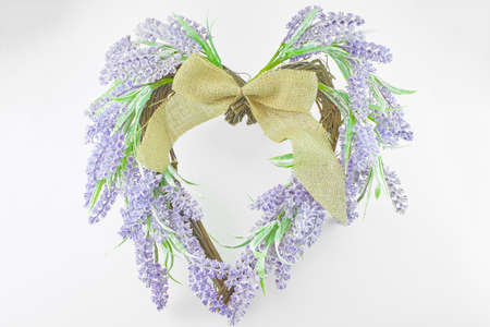 Lavender wreath heart-shaped isolated on white background.の写真素材