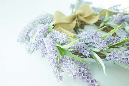 Lavender wreath heart-shaped isolated on white background.の写真素材