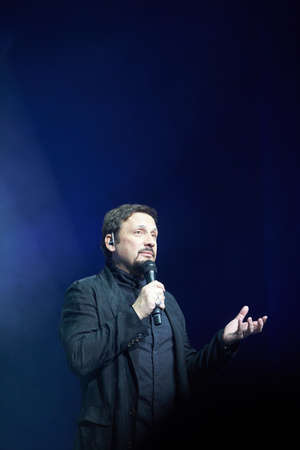 Russian singer Stas Mihailov sings on stage.