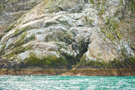 Beautiful island in the Irish Sea with heart shaped cave. Landscapes of Ireland.
